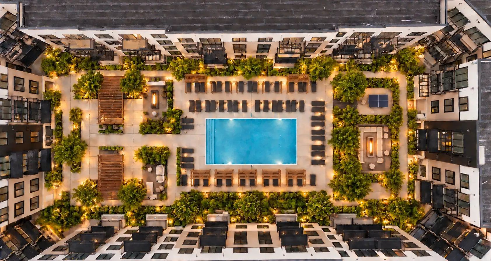 Rendering of the courtyard from above with the pool, cabanas and lounge chairs