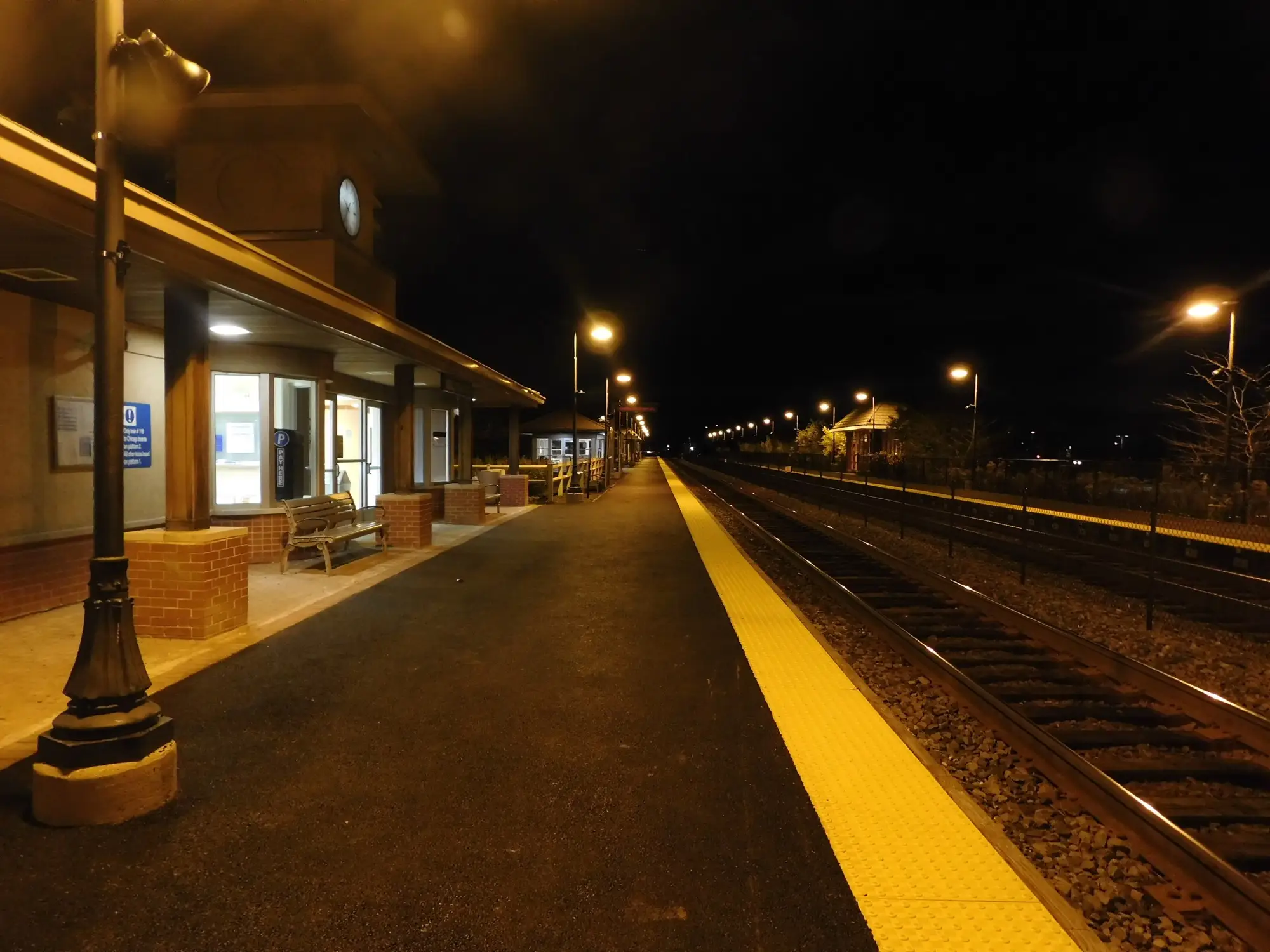 Buffalo Grove Metra station platform and shelter at dusk